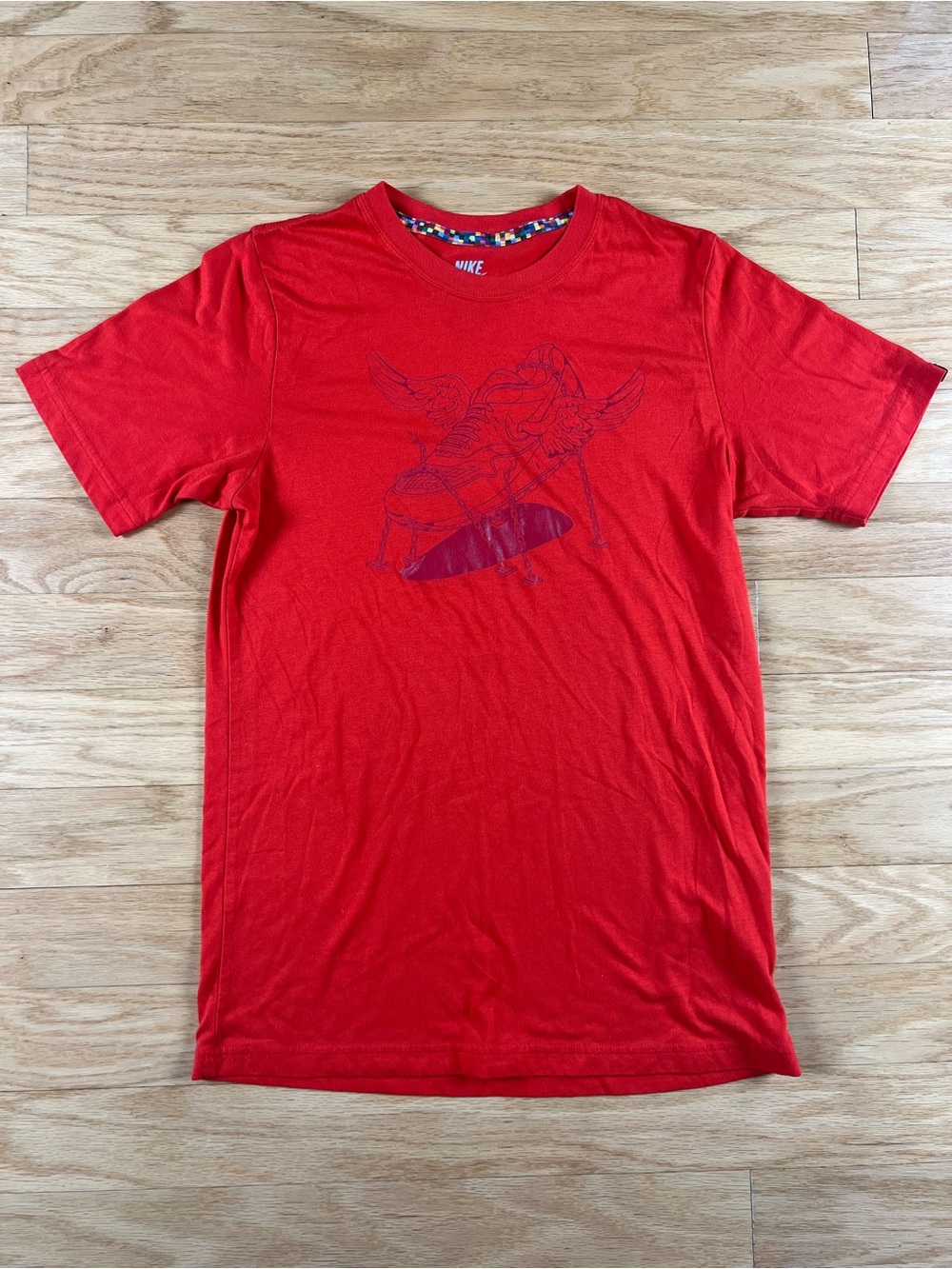 Nike Winged Shoe Graphic Tee in Red